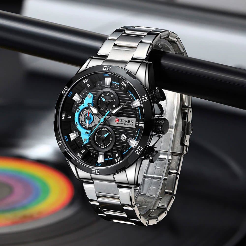 Reloj Curren + Punzón extractor